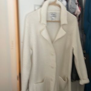 Like new Beautiful white sweater jacket.
